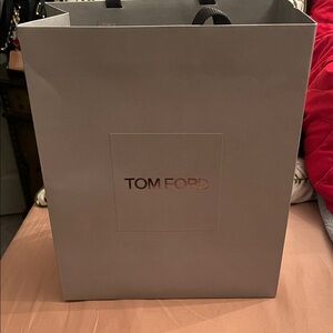 Tom Ford with tiny dust bag and wipe